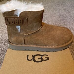 Super cute mini Bailey logo strap UGG boots! Size 6! Never worn brand new!:)
